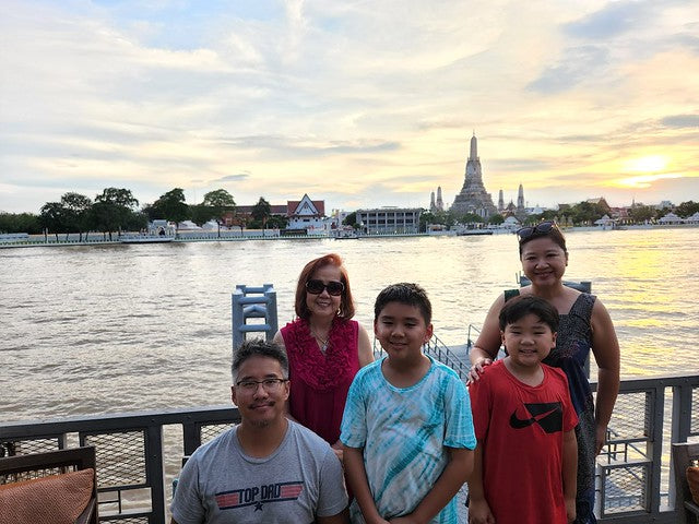 Joanne Kwong and family in Thailand by the water