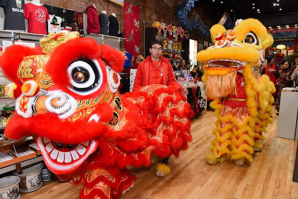 Lion dancers in the Pearl River Mart Soho store