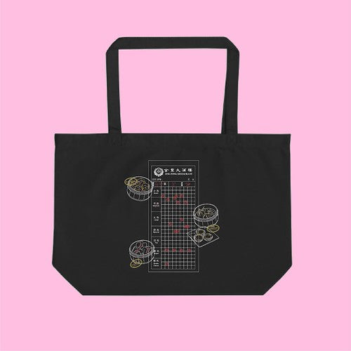Black Jing Fong tote bag on pink background