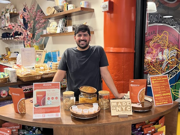 Doosra founder at tasting in Pearl River Mart Foods
