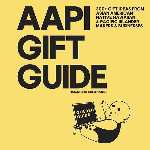 AAPI gift guide cover with chubby baby at laptop and yellow background