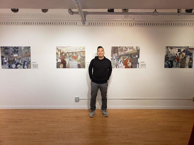 Artist Jerry May with his work in the Pearl River Mart gallery in Tribeca