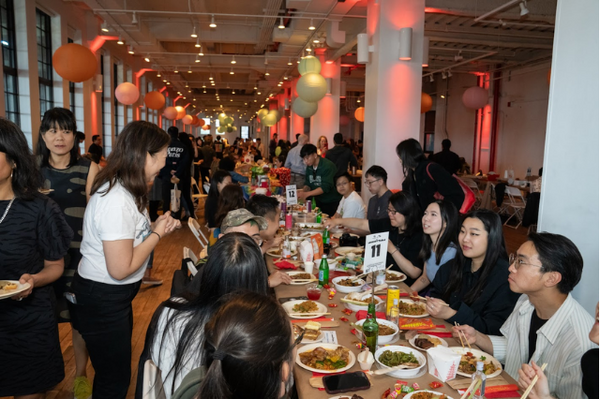 Guests at the 2025 Longest Table potluck event hosted by Pearl River Mart and Green Tile Social Club