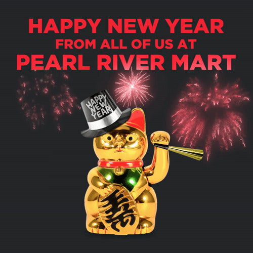A gold lucky cat wearing a New Year hat