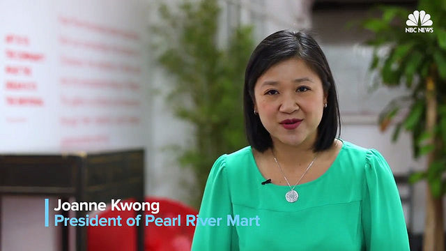 Pearl River Mart President Joanne Kwong in green blouse