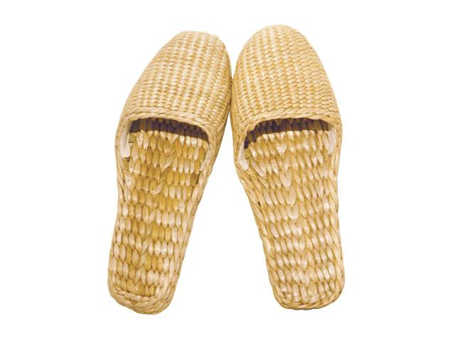 Pair of braided straw slippers