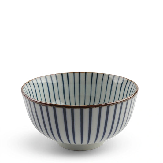 A white ceramic bowl with vertical blue stripes and a brown rim is centered on a plain white background. The design is simple and elegant.