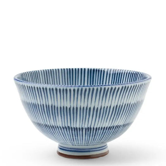 A ceramic bowl with a blue and white striped ribbed pattern, standing on a small round base against a plain white background.