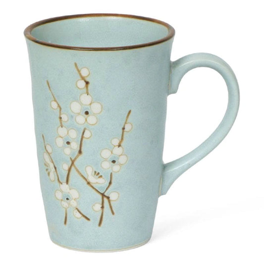 A light blue ceramic mug with a brown rim, decorated with white blossoms and brown branches, on a white background.