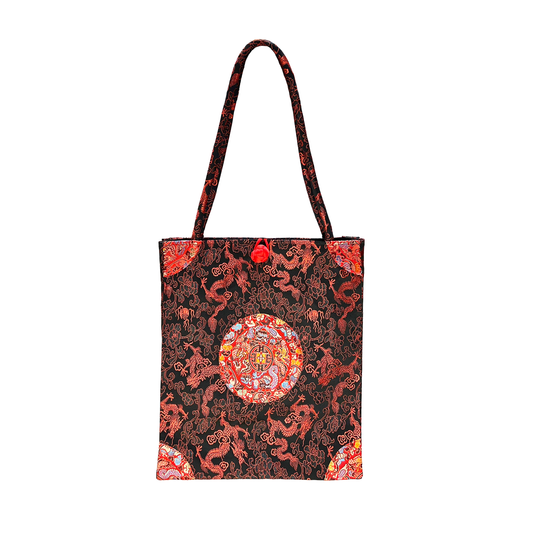 Tote bag with dragon design on a white background