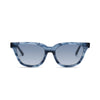 Front view of Covry - Trix Denim Sunglasses with dark blue tortoise frame and gradient blue lenses.