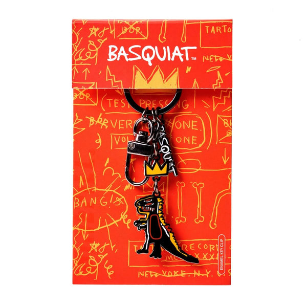 Keychain with a dinosaur design on a red background with 'Basquiat' branding.