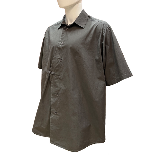 Dark gray short-sleeve shirt on a mannequin against a white background