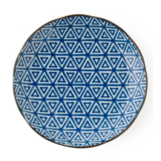 Blue geometric patterned plate on a white background