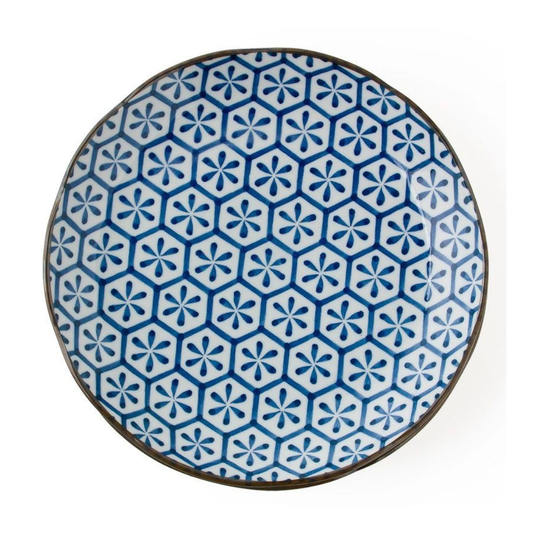 Round ceramic plate with blue geometric pattern on a white background