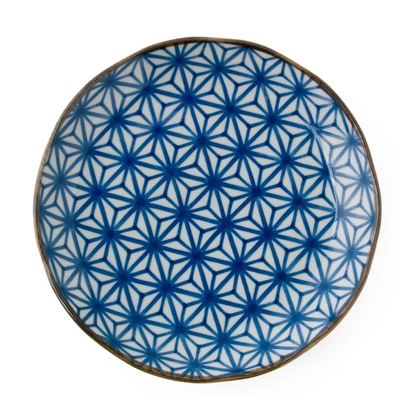 Ceramic plate with blue geometric pattern on a white background