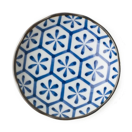 Ceramic plate with blue geometric pattern on a white background