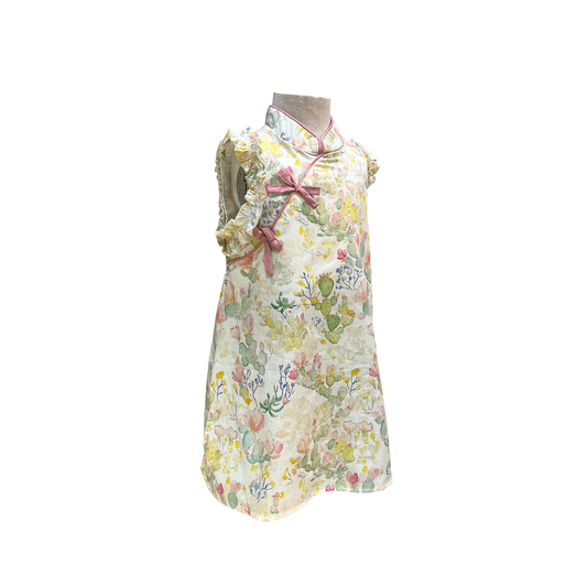 Floral dress on a mannequin against a white background