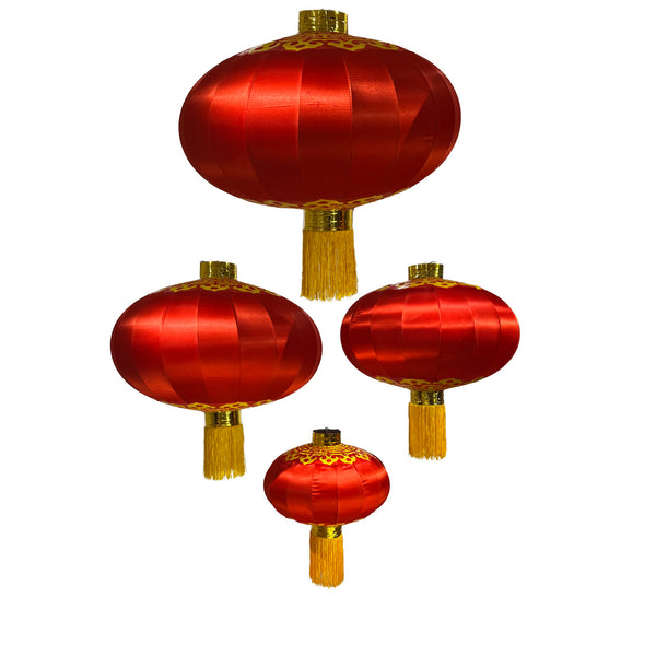 Set of four red Chinese lanterns with gold tassels on a white background