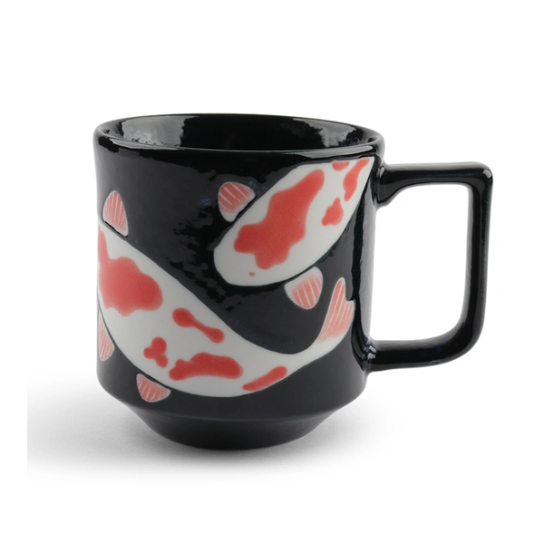 Black mug with red and white abstract design on a white background