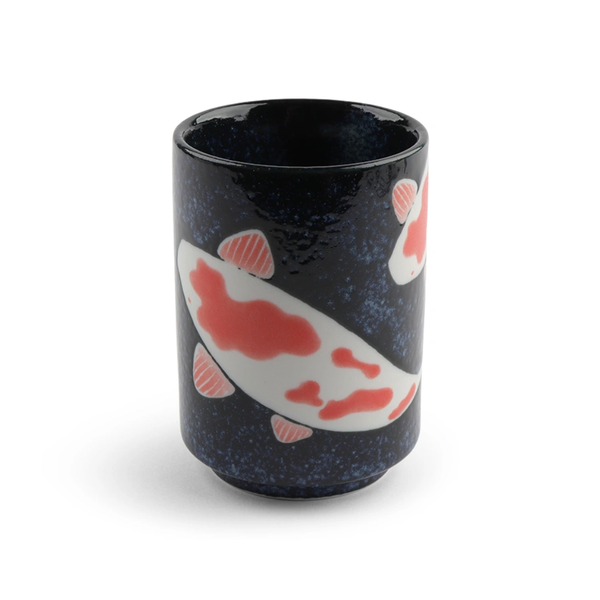 Black tumbler with red and white fish design on a white background
