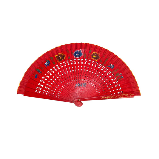 Red hand fan with floral designs on a white background