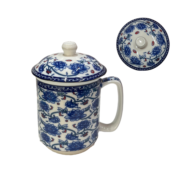 Ceramic mug with blue floral pattern and matching lid on a white background