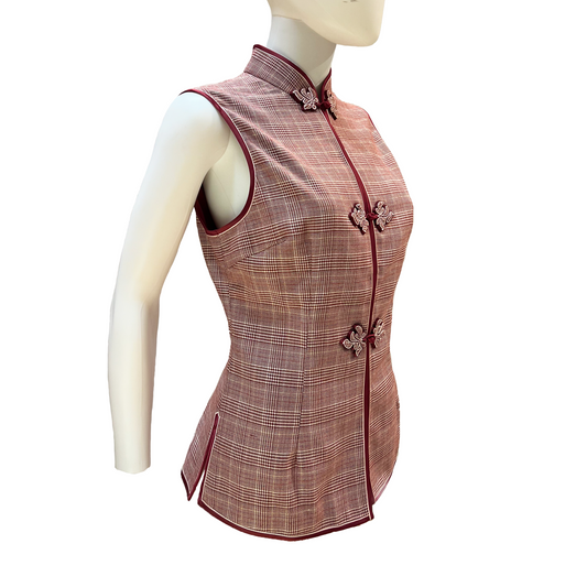 Red and white checkered vest on a mannequin against a white background