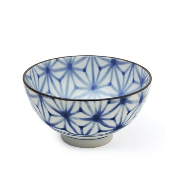 Ceramic bowl with blue and white pattern on a white background