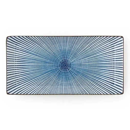 A rectangular ceramic plate with a blue and white radial dotted pattern, featuring a dark brown rim, shown against a plain white background.
