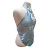 Blue floral halter top on a mannequin against a white background