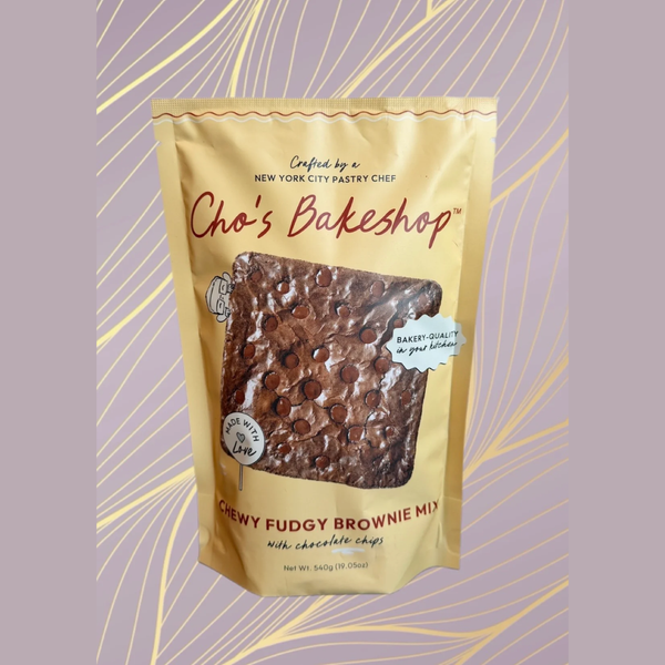 Packaging of Cho's Bake Shop chewy fudgy brownie mix on a decorative background