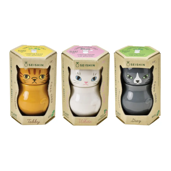 Three cat-shaped planters in their packaging with 'Seishin' branding on a white background.