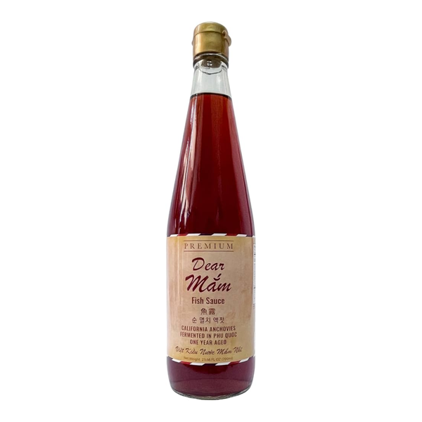 Bottle of Dear Mam brand fish sauce on white background