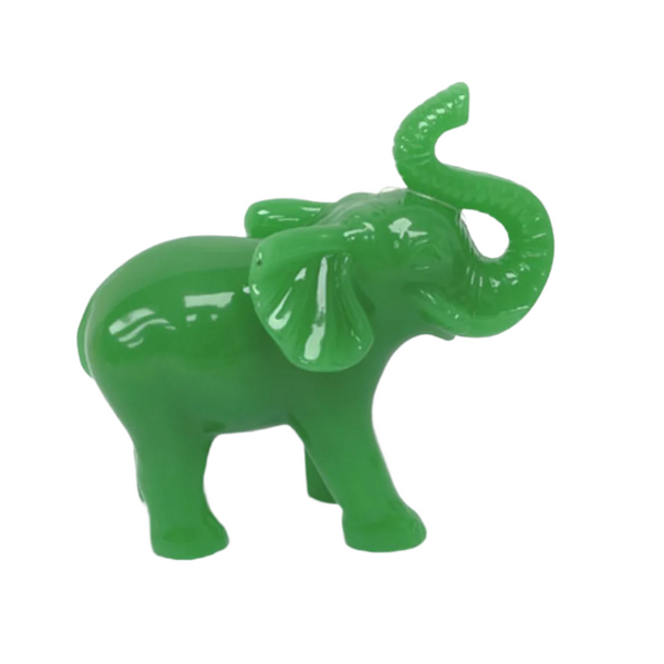 Green elephant figurine on a white background
