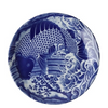 Ceramic plate with blue and white fish design on a white background