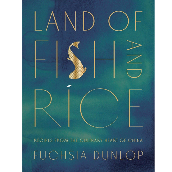 Book cover of 'Land of Fish and Rice' with a gold fish illustration on a blue and green gradient background.