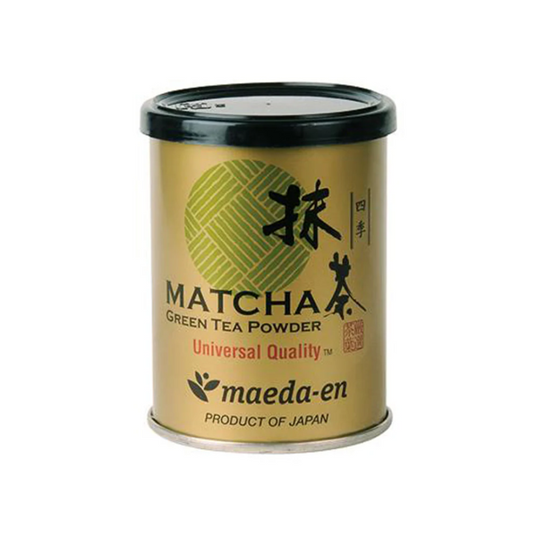 Gold canister of Matcha green tea powder with branding on a white background
