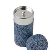 Cylindrical canister with floral pattern and metallic lid on a white background