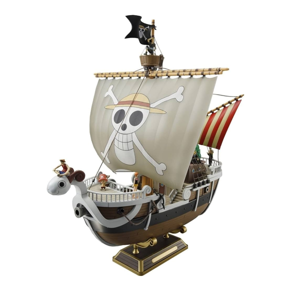 Model of a pirate ship with a skull and crossbones sail on a white background