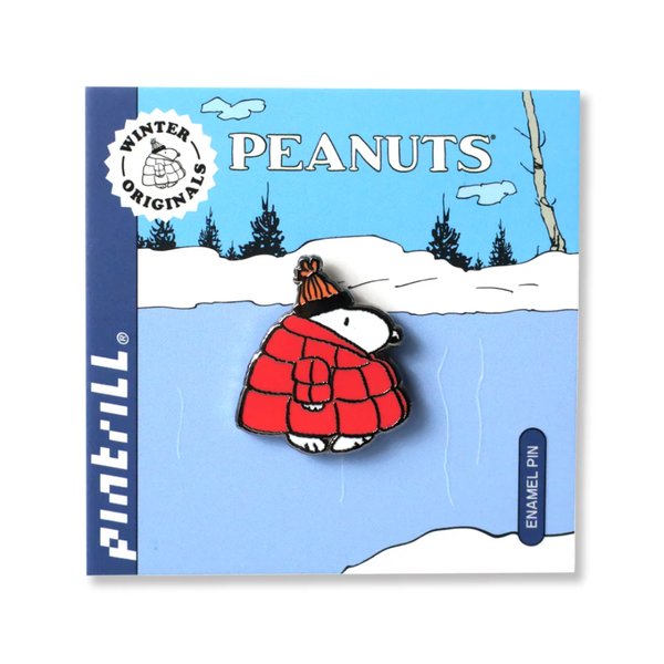Peanuts enamel pin with Snoopy in a red coat on a blue background with 'Peanuts' branding.