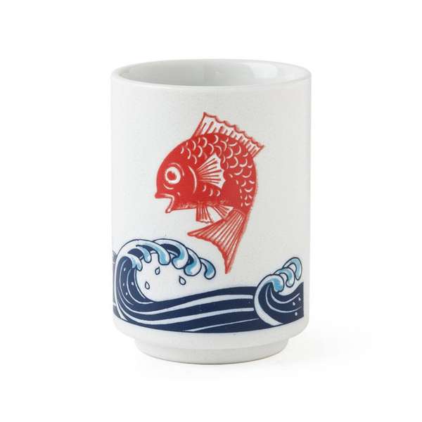 White cup with red fish and blue wave design on a white background