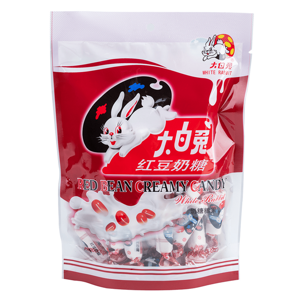 A stand-up pouch of White Rabbit Red Bean Creamy Candy on a plain white background. The packaging is predominantly red and white with a large illustration of a white rabbit and the brand name 'White Rabbit' visible in English and Chinese.