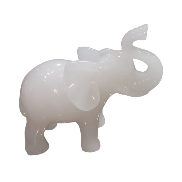 White elephant figurine on a white background