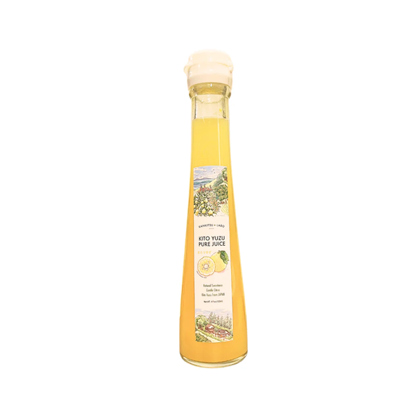 Bottle of yuzu pure juice on white background