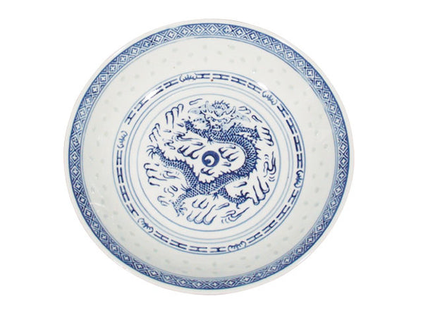 A vintage white plate with dark blue accents around a powerful dragon perfect for any meal