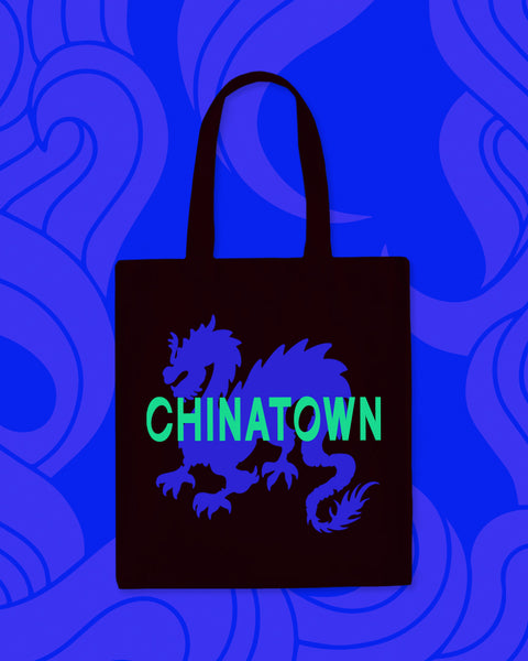 Black tote bag with blue dragon design and "Chinatown" in green
