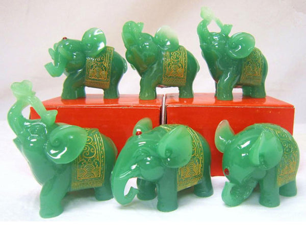 Red stud embellished jade green elephant figurine