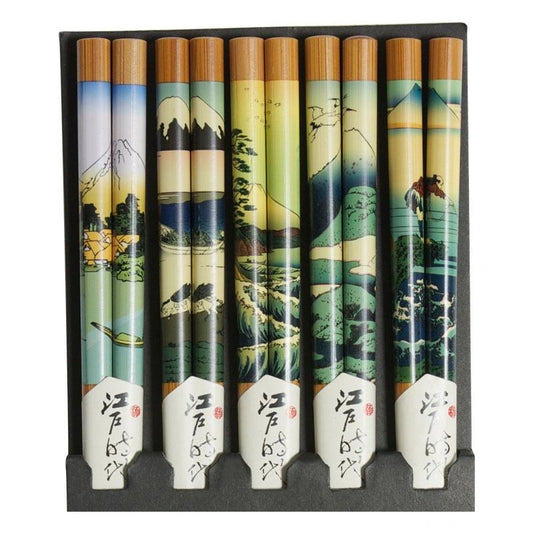 A set of five Japanese chopsticks, featuring bamboo-colored handles with traditional landscape illustrations and white tips with Japanese calligraphy.