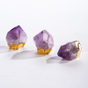 Three gold gilded amethyst stones